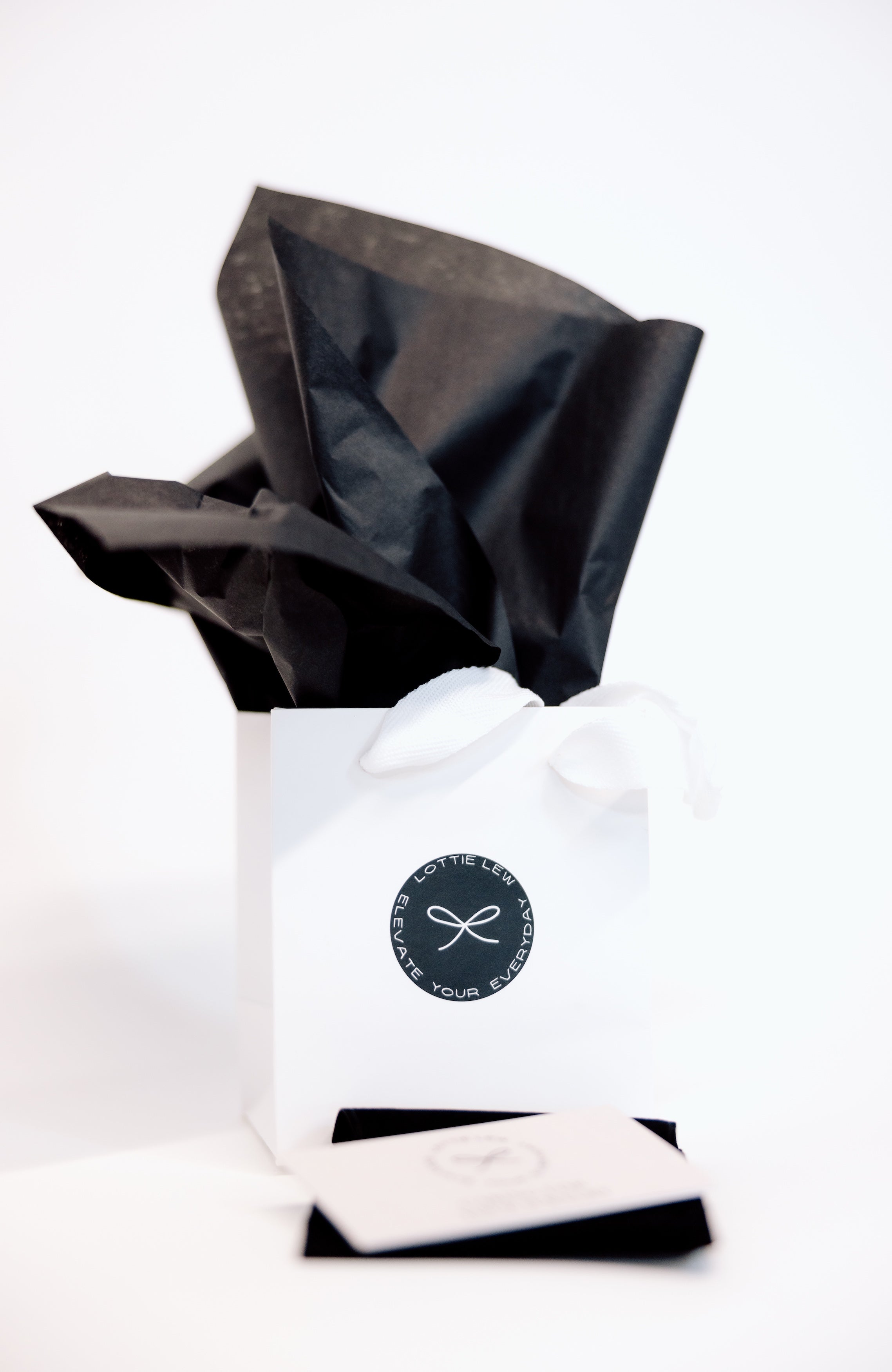 We deliver our 18K gold-filled and semi-precious stone stretch bracelets in beautiful branded packaging including a gift bag, dust bag and care card.