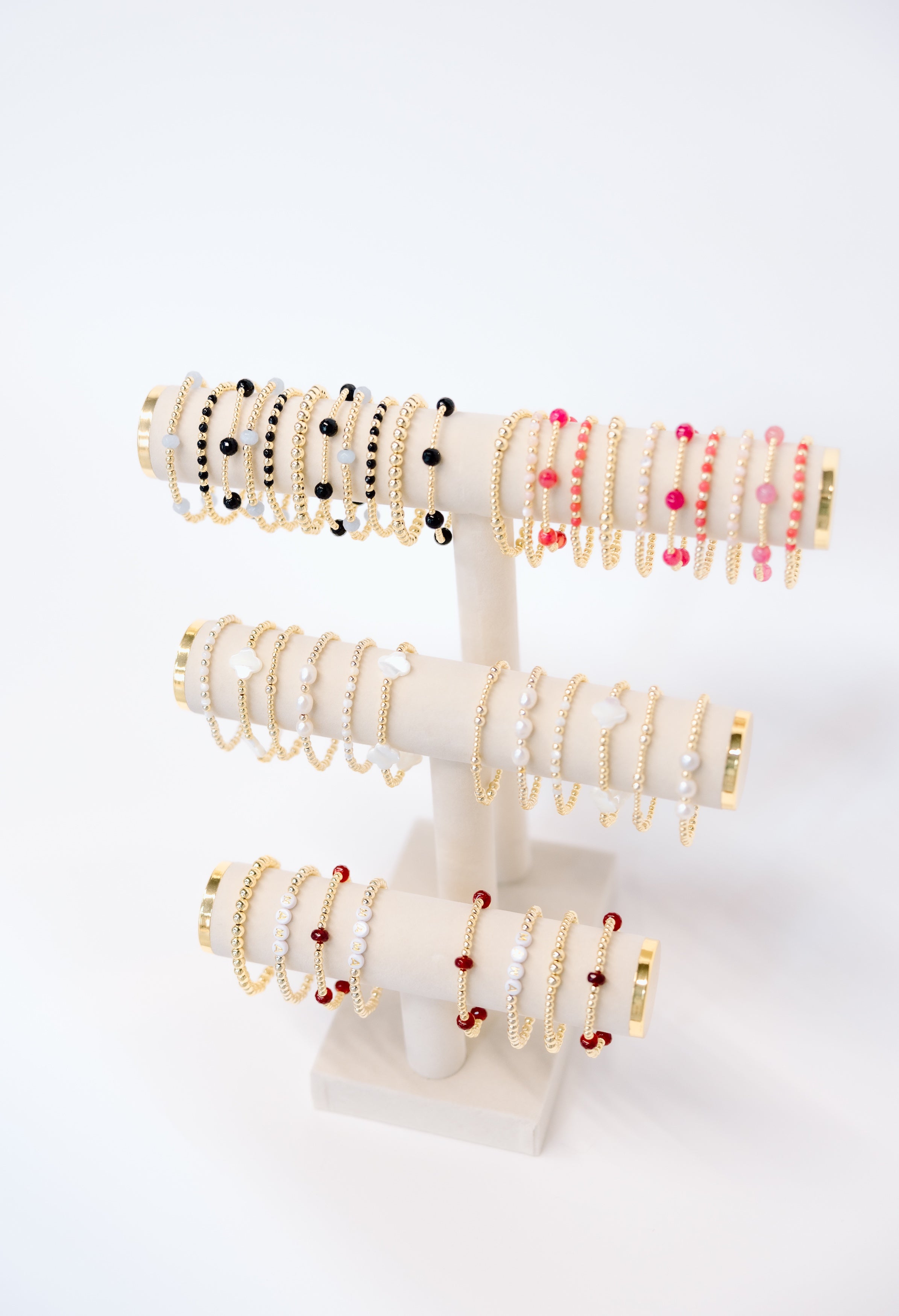 18K gold-filled and semi-precious stone stretch bracelets. Similar to enewton bracelets.